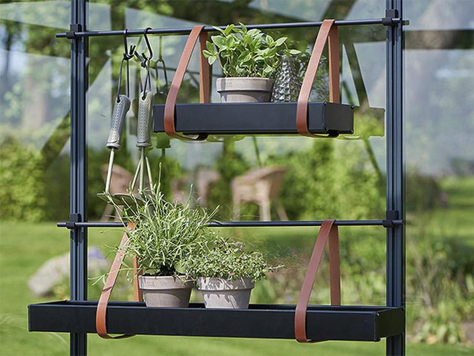 Two Juliana hanging Shelves with leather straps with tools and plants