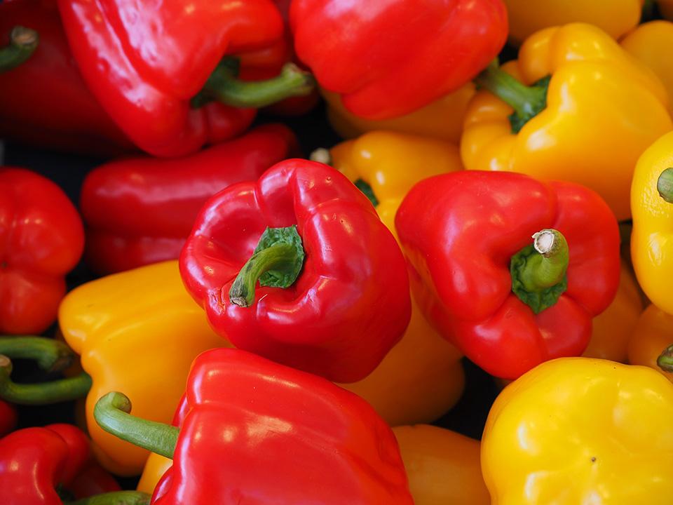 Several pieces of red and yellow peppers